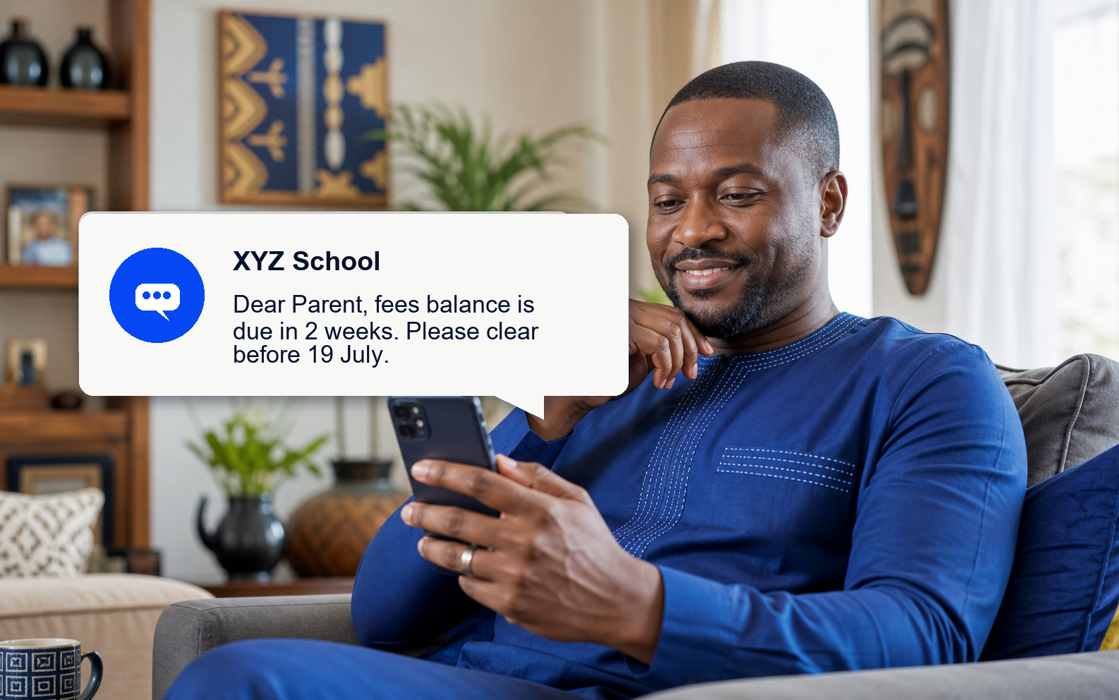 Parent at home receiving an XYZ School fees reminder SMS